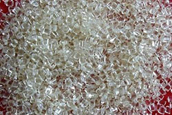 Processed mixed plastics (pots, trays and tubs) to be used in the manufacture of car dashboards.
